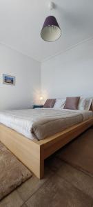 Postel nebo postele na pokoji v ubytování Apollo Romantic Sea View Villa