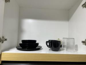 Příslušenství pro přípravu čaje a kávy v ubytování Didien's Apartment