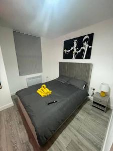 Katil atau katil-katil dalam bilik di Apartment Near Leeds City Centre Sleeps 4