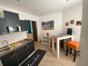 Dapur atau dapur kecil di Ferienwohnungen Allgäu Zimmer +4 gambar