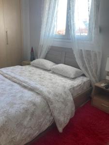 A bed or beds in a room at Small apartment, great view!
