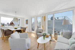 Posezení v ubytování Ferienhaus Hausboot Seeteufel Olpenitz