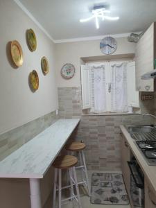 Η κουζίνα ή μικρή κουζίνα στο casa Gioiello di Enrica +30 φωτογραφίες