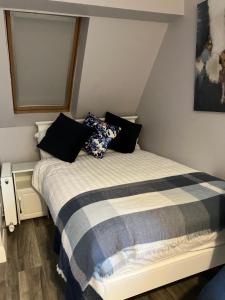 Postel nebo postele na pokoji v ubytování Oakwood B&B