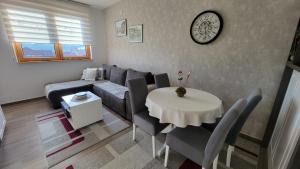 Posezení v ubytování Goldview Apartmani