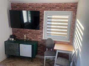 Wiślańskie Doliny tesisinde bir televizyon ve/veya eğlence merkezi