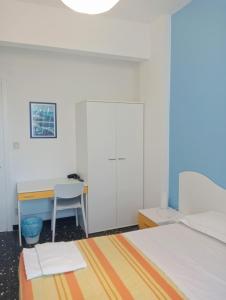 A bed or beds in a room at Albergo Belvedere