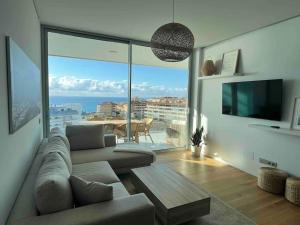 Posezení v ubytování Luxe Coast Views-Reserva del-Higuerón-Pool & Sea