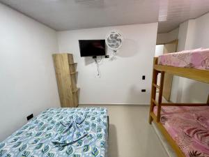 Letto o letti in una camera di HOTEL TORRE DELUXE ¨SANTORINI¨