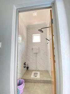 Baðherbergi á Rumah Hana Sekinchan - Mslim0nly