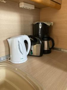 Coffee and tea making facilities at Small apartment, great view!