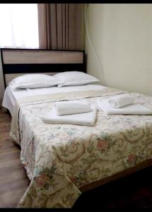 Letto o letti in una camera di Guest House Lotus