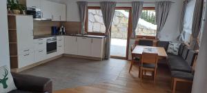 Kuchyň nebo kuchyňský kout v ubytování Ferienwohnung Widmann