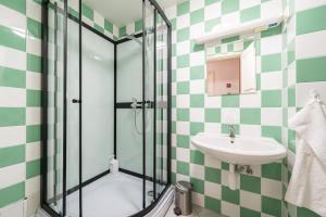 Koupelna v ubytování Old Town - Demini Apartment + 5 fotografií