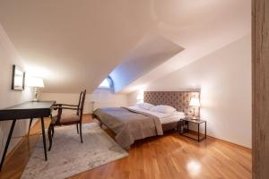 Postel nebo postele na pokoji v ubytování Old Town - Demini Apartment