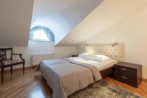 Postel nebo postele na pokoji v ubytování Old Town - Demini Apartment