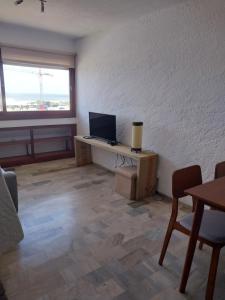 TV tai viihdekeskus majoituspaikassa Apartamento Alberobello