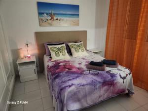 Posteľ alebo postele v izbe v ubytovaní Apartament Naranja con piscina urb El Paraiso