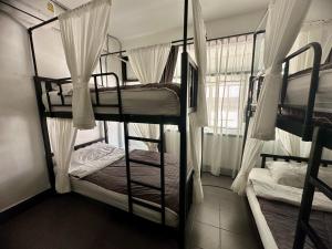 a bedroom with two bunk beds in a hostel at Backpack Hostel in Chiang Rai +154 photos