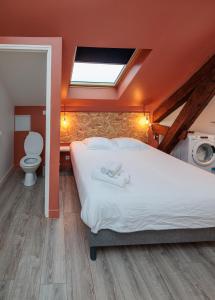 Posteľ alebo postele v izbe v ubytovaní Résidence Leclerc - Appartements d'hôtes - Secteur thermal