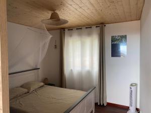 Cama o camas de una habitación en Maison vue mer La Réunion
