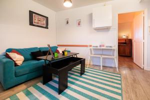 Kuchyňa alebo kuchynka v ubytovaní Résidence Leclerc - Appartements d'hôtes - Secteur thermal