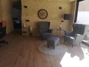 Posezení v ubytování Höhlenapartment
