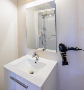 Kúpeľňa v ubytovaní Résidence Leclerc - Appartements d'hôtes - Secteur thermal
