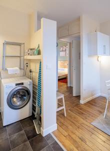 Posteľ alebo postele v izbe v ubytovaní Résidence Leclerc - Appartements d'hôtes - Secteur thermal