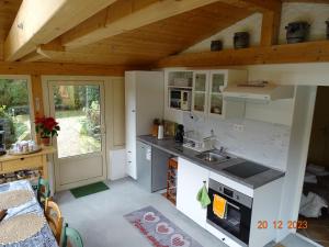 ครัวหรือมุมครัวของ Gîte du Grand Cèdre