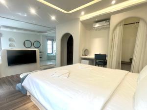 TV a/nebo společenská místnost v ubytování Mellon OASIS Phu Quoc