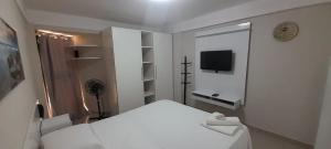 TV a/nebo společenská místnost v ubytování Sensacional flat no Mardisa