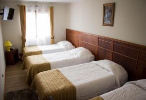 Voodi või voodid majutusasutuse Hotel Terrazas del Mar toas