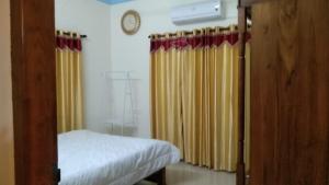 Photo de la galerie de l'établissement Greenland Homestay, à Manimala