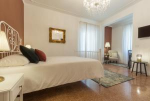 Postel nebo postele na pokoji v ubytování Casa dei Liuti Luxury GuestHouse