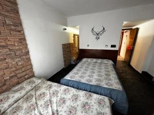 Ένα ή περισσότερα κρεβάτια σε δωμάτιο στο Casa hasta 11 personas