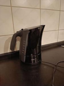 a coffee pot sitting on top of a counter at Ferienwohnung in Wrist