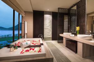 Voodi või voodid majutusasutuse Banyan Tree Huangshan toas