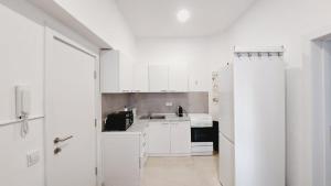 Kuchyňa alebo kuchynka v ubytovaní CheckInVienna-One bedroom Apartment