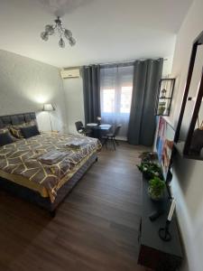 Postel nebo postele na pokoji v ubytování Apartman Felix