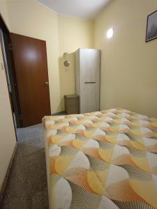 Giường trong phòng chung tại Apartman Breza Divcibare