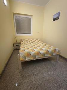 Giường trong phòng chung tại Apartman Breza Divcibare