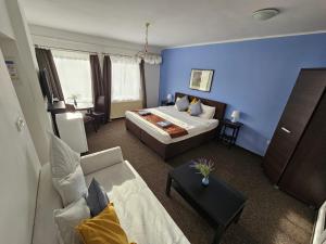 Posteľ alebo postele v izbe v ubytovaní Joy Guesthouse