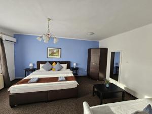Posteľ alebo postele v izbe v ubytovaní Joy Guesthouse