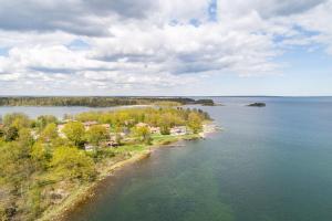 an aerial view of an island in the water at Gästhus nära havet in Kalmar