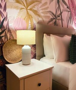 Ένα ή περισσότερα κρεβάτια σε δωμάτιο στο Blush Jungle - Homestay