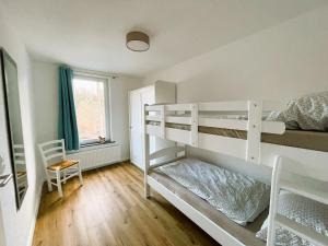 Двухъярусная кровать или двухъярусные кровати в номере Harzhaus Drei Hexen