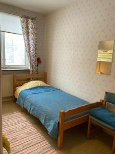 Postel nebo postele na pokoji v ubytování Fristad Hostel Vitsand