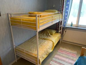 Postel nebo postele na pokoji v ubytování Fristad Hostel Vitsand