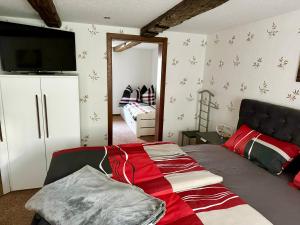 Postel nebo postele na pokoji v ubytování Ferienhaus an der “Ilse”